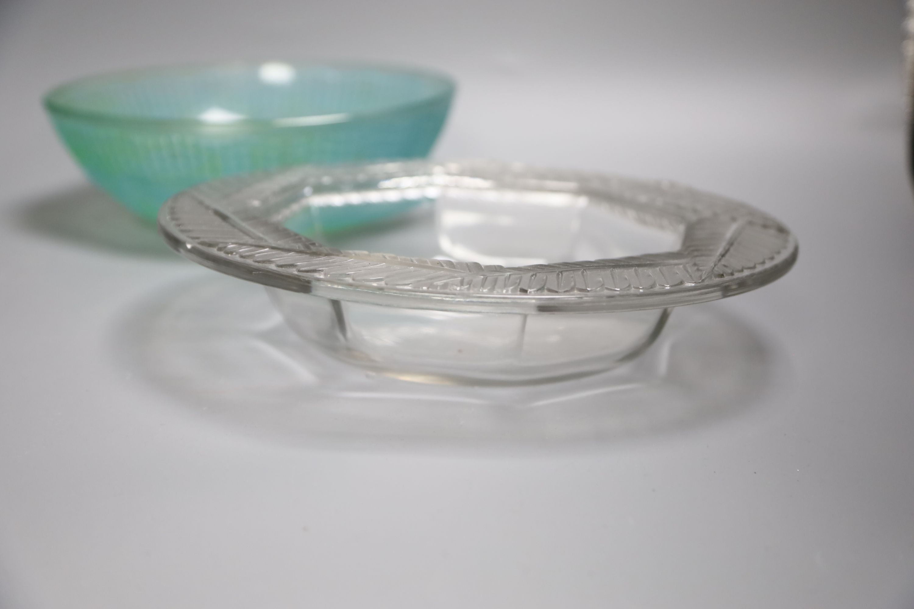 A Lalique post-war fern-rimmed circular bowl with octagonal interior and a green glass fruit bowl Dia 28cm; 24cm